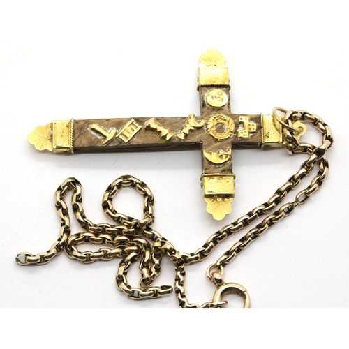 1002 - Yellow metal and wooden crucifix on a 9ct gold chain, 8.3g. P&P Group 1 (£14+VAT for the first lot a... 