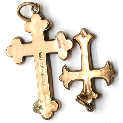 1001 - 9ct gold crucifix pendant and a further unmarked example, combined 2.5g, largest H: 34mm. P&P Group ... 