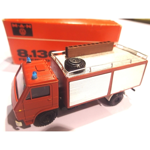 2210 - Conrad MAN 8.136 fire truck, approximately 1:43 scale. P&P Group 1 (£14+VAT for the first lot and £1... 