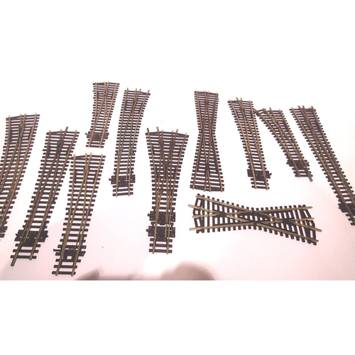 2294 - Eleven assorted Peco and Hornby points including 3 way mostly good/used. P&P Group 1 (£14+VAT for th... 