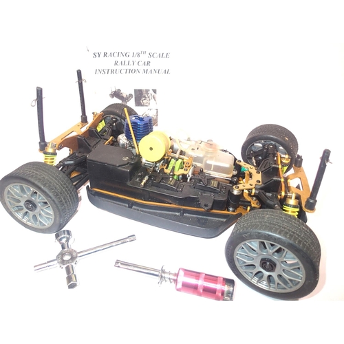 2306 - SY Racing 1:8 scale radio control racing car. Four wheel drive, glow fuel engine, with receiver, tra... 