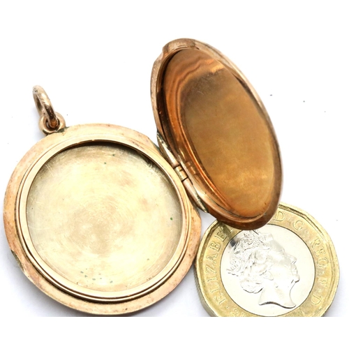 1050 - Presumed 9ct gold circular locket with machine turned decoration, unmarked, D: 31 mm, 10.7g. P&P Gro... 