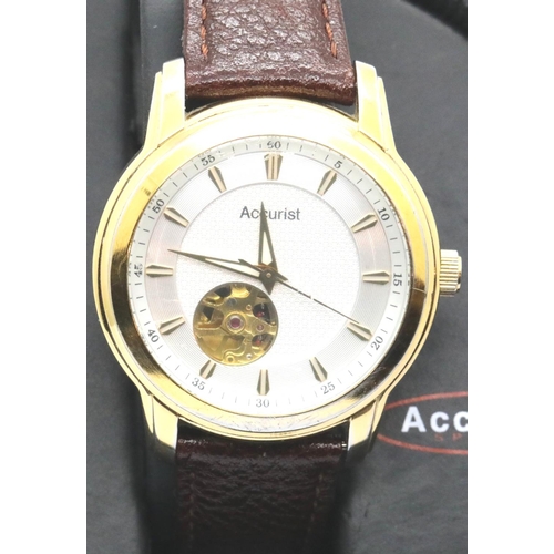 1091 - Gents Accurist Visual Escapement wristwatch on a leather strap. P&P Group 1 (£14+VAT for the first l... 