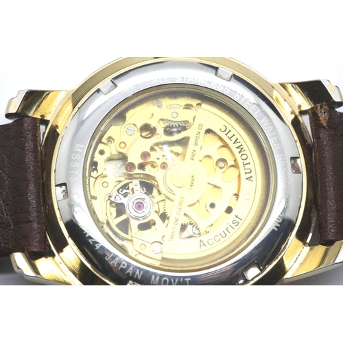 1091 - Gents Accurist Visual Escapement wristwatch on a leather strap. P&P Group 1 (£14+VAT for the first l... 