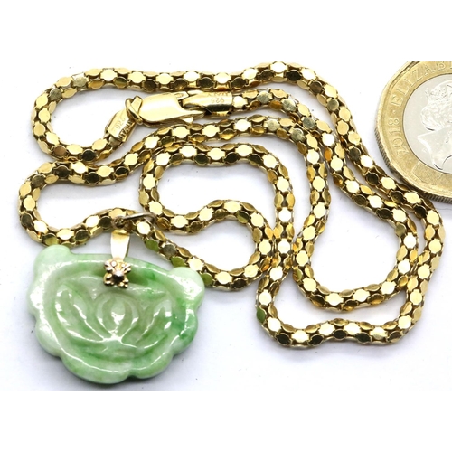 1129 - Jade and 925 silver gilt necklace, chain L: 44 cm, pendant L: 2.5 cm, total 12.5g. Clasp fully funct... 