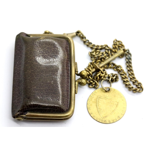 1183 - Victorian leather and brass sovereign and half sovereign sprung purse, with Albert chain and Guinea ... 