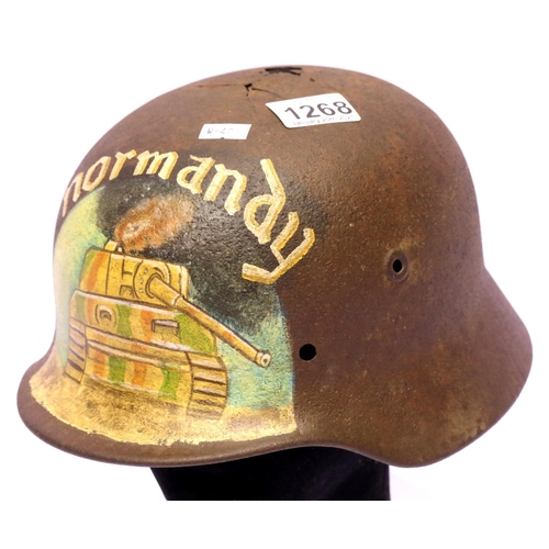 1268 - WWII German Normandy found M40 helmet with post war memorial painting. P&P Group 2 (£18+VAT for the ... 