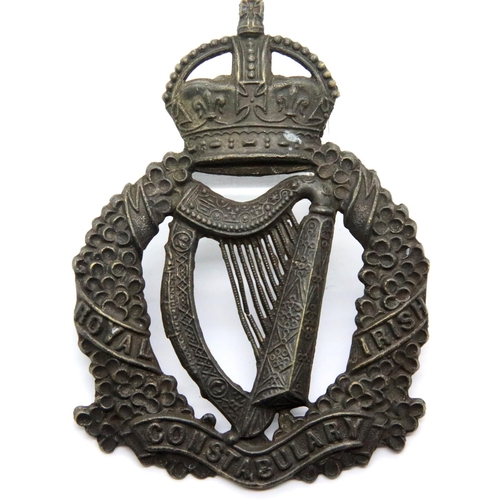 1297 - Royal Irish Constabulary pressed metal helmet plate, unused. P&P Group 1 (£14+VAT for the first lot ... 