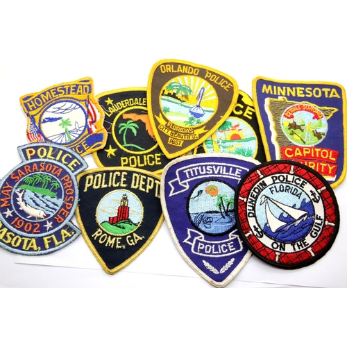 1298 - A collection of mostly American Police Department sleeve patches, including Orlando, Sarasota and La... 