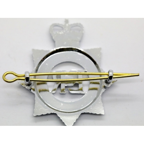 1302 - Metropolitan Police enamelled metal cap badge, unused. P&P Group 1 (£14+VAT for the first lot and £1... 