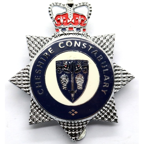 1305 - Cheshire Constabulary enamelled metal cap badge, unused. P&P Group 1 (£14+VAT for the first lot and ... 