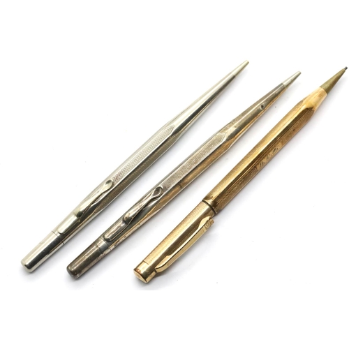 1315 - Sterling silver Life Long propelling pencil, a further chromed example and an Eversharp gold plated ... 