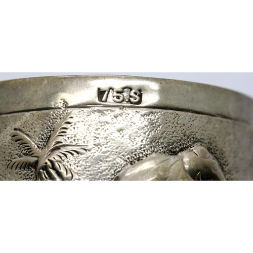 1367 - Indian silver relief decorated circular napkin ring, marked 75S, and a hallmarked silver napkin ring... 