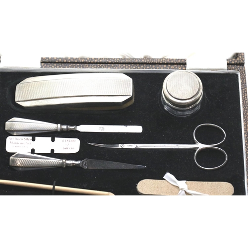 1375 - George V Art Deco hallmarked silver manicure set, Birmingham assay 1935, of seven pieces. P&P Group ... 