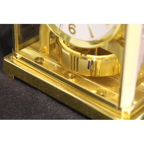 1432 - Brass cased Jaeger Le Coultre Atmos clock, the case and glass in good condition, runs then stops. P&... 