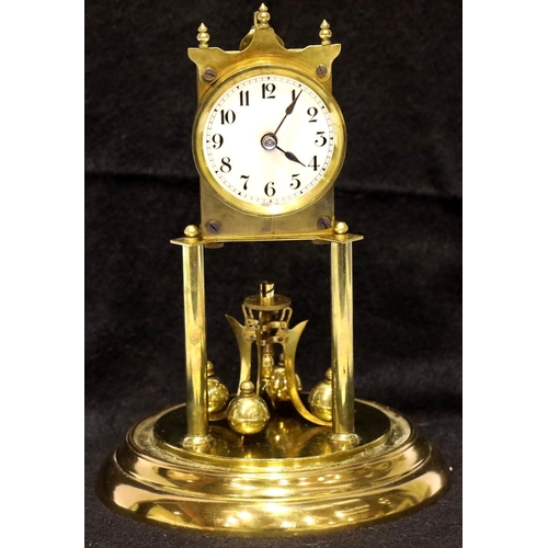 1436 - Glass domed mechanical brass anniversary clock, H: 31 cm. P&P Group 3 (£25+VAT for the first lot and... 