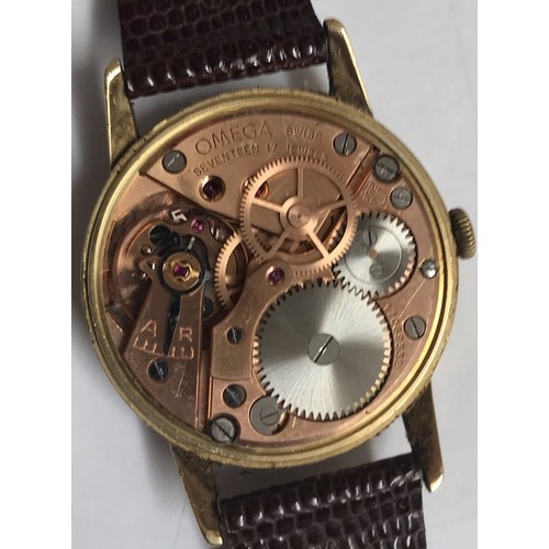 1100 - 9ct gold Omega gents 17 jewel wristwatch with 1960 presentation inscription on an Omega leather stra... 