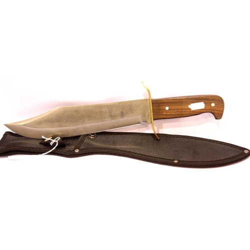 1397 - Large Bowie type knife with wooden handle, in sheath. P&P Group 1 (£14+VAT for the first lot and £1+... 