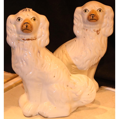 301 - Pair of white glazed Staffordshire dog figurines, H: 35 cm. Not available for in-house P&P, contact ... 