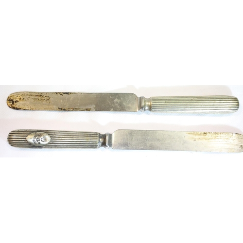 3057 - Victorian pair of silver plate and steel dinner knives, presumably officers mess, engraved crest to ... 