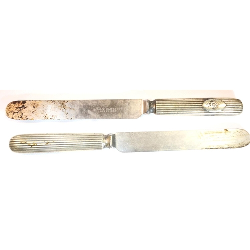 3057 - Victorian pair of silver plate and steel dinner knives, presumably officers mess, engraved crest to ... 