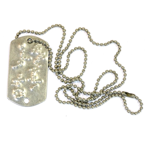 3072 - Iraqi military dog tag on chain. P&P Group 1 (£14+VAT for the first lot and £1+VAT for subsequent lo... 