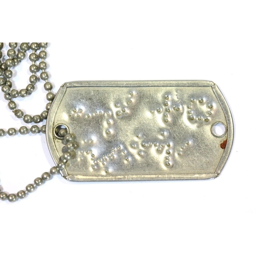 3072 - Iraqi military dog tag on chain. P&P Group 1 (£14+VAT for the first lot and £1+VAT for subsequent lo... 