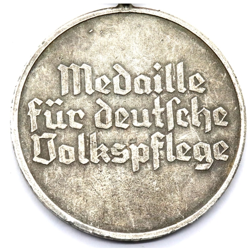 3380 - German Third Reich type Social Welfare medal. P&P Group 1 (£14+VAT for the first lot and £1+VAT for ... 