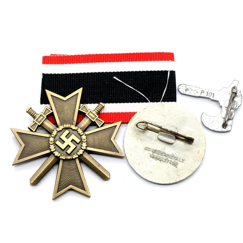 3392 - German WWII type War Merit cross in bronze, a 1936 tinny and a further pin badge. P&P Group 1 (£14+V... 