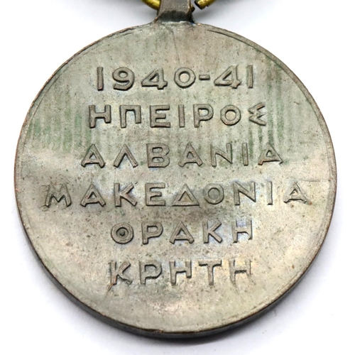 3420 - Greek WWII type War medal. P&P Group 1 (£14+VAT for the first lot and £1+VAT for subsequent lots)