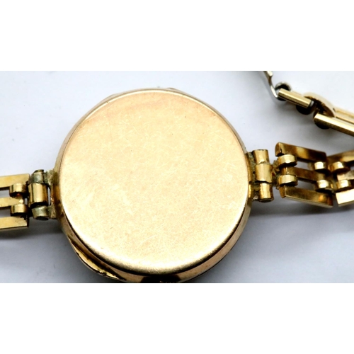 1026 - 9ct gold cased Rotary wristwatch on a gold plated bracelet, 13.9g total. P&P Group 1 (£14+VAT for th... 