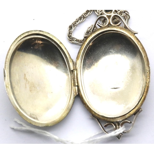 1044 - Hallmarked silver locket and chain, H: 40 mm, chain L: 76 cm, 23g. P&P Group 1 (£14+VAT for the firs... 