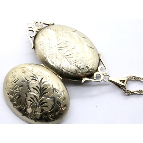 1044 - Hallmarked silver locket and chain, H: 40 mm, chain L: 76 cm, 23g. P&P Group 1 (£14+VAT for the firs... 