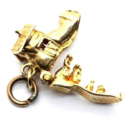 1049 - 9ct gold mask and boot charms,boot L: 14 mm, combined 3.6g. P&P Group 1 (£14+VAT for the first lot a... 