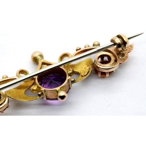 1069 - 9ct gold amethyst set brooch, L: 45 mm, 3.7g. P&P Group 1 (£14+VAT for the first lot and £1+VAT for ... 