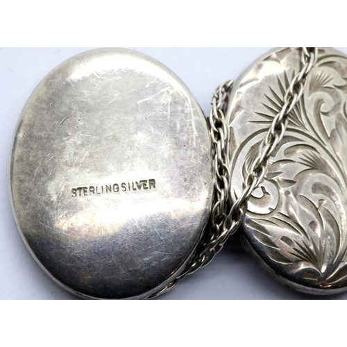 1070 - Sterling silver locket and chain, locket L: 2 cm, chain L: 50 cm, total weight: 7g. P&P Group 1 (£14... 