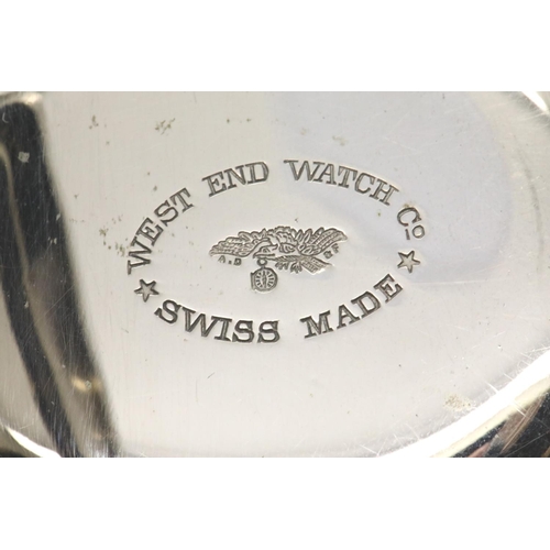 1092 - West End Watch Co white metal pocket watch with steam train to verso. P&P Group 1 (£14+VAT for the f... 