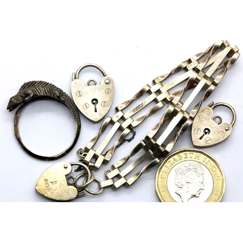 1097 - Silver gate bracelet with padlock charm, two silver padlocks and a silver chameleon badge.  P&P Grou... 