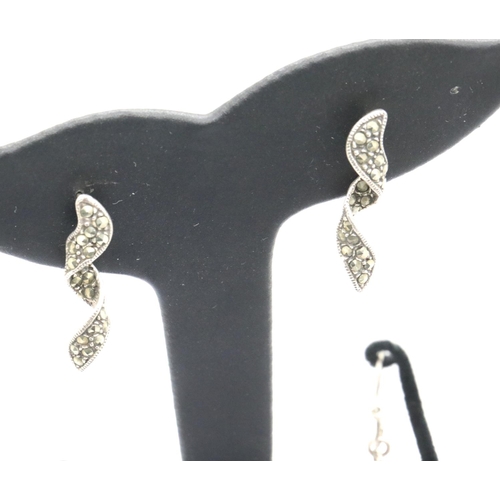 1155 - Seven pairs of silver earrings on display stands. P&P Group 1 (£14+VAT for the first lot and £1+VAT ... 