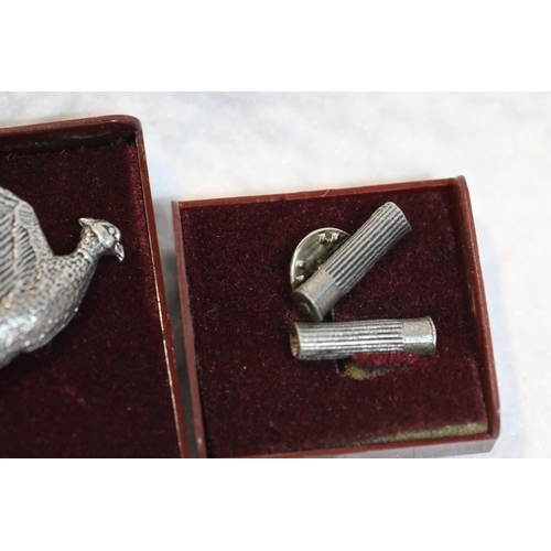 1228 - Miniature Puma folding knife (blade 16 mm) two white metal cartridge pins and a pheasant brooch. P&P... 