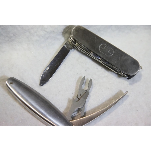 1244 - Two new old stock multi tool knives. P&P Group 1 (£14+VAT for the first lot and £1+VAT for subsequen... 