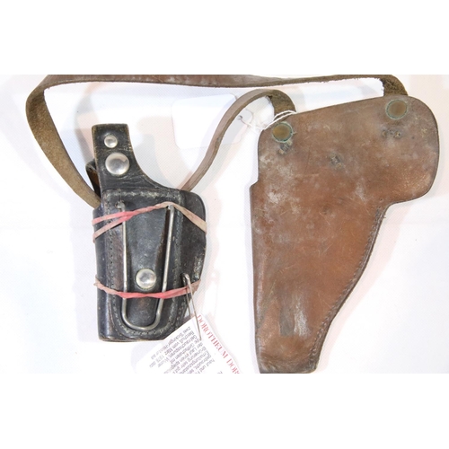 1283 - Two leather pistol holsters. P&P Group 2 (£18+VAT for the first lot and £3+VAT for subsequent lots)