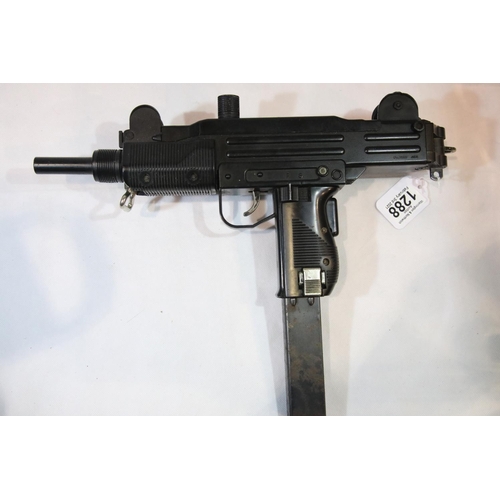 1288 - Mini uzi machine pistol BB gun. P&P Group 3 (£25+VAT for the first lot and £5+VAT for subsequent lot... 