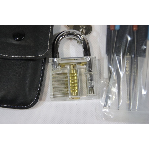 1294 - Leather cased lock picking kit with practice lock. P&P Group 1 (£14+VAT for the first lot and £1+VAT... 