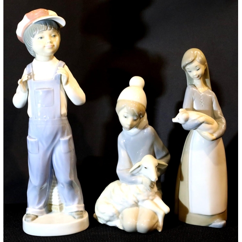 1349 - Three Lladro child figurines. P&P Group 3 (£25+VAT for the first lot and £5+VAT for subsequent lots)... 