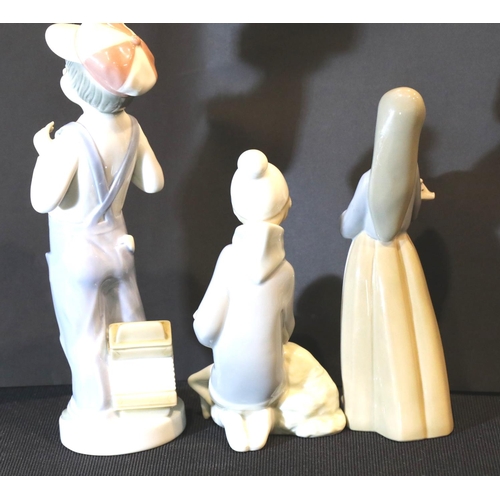 1349 - Three Lladro child figurines. P&P Group 3 (£25+VAT for the first lot and £5+VAT for subsequent lots)... 