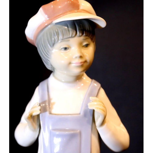 1349 - Three Lladro child figurines. P&P Group 3 (£25+VAT for the first lot and £5+VAT for subsequent lots)... 