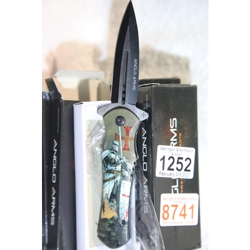 1252 - Nine new boxed Anglo Arms folding knives, blade L: 10 cm. P&P Group 2 (£18+VAT for the first lot and... 