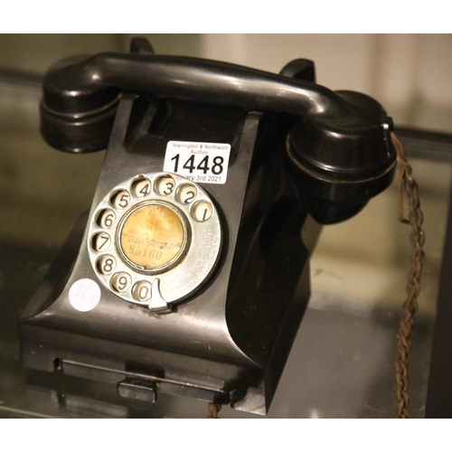 1448 - Black bakelite dial telephone. P&P Group 2 (£18+VAT for the first lot and £3+VAT for subsequent lots... 