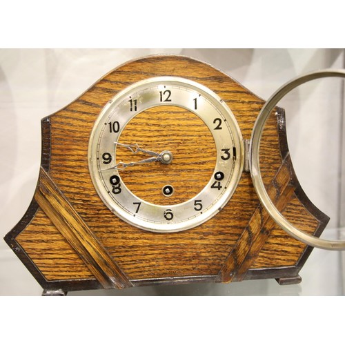 1486 - Oak cased Westminster chiming mantel clock, H: 26 cm, working at time of lotting. Not available for ... 